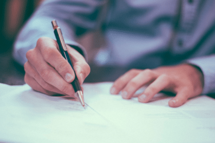 Man writing on paper